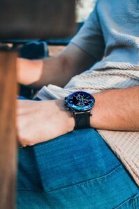 Smartwatch on wrist showcasing potential Gemini on Wear OS integration