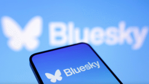 Bluesky decentralized social media platform logo displayed on smartphone