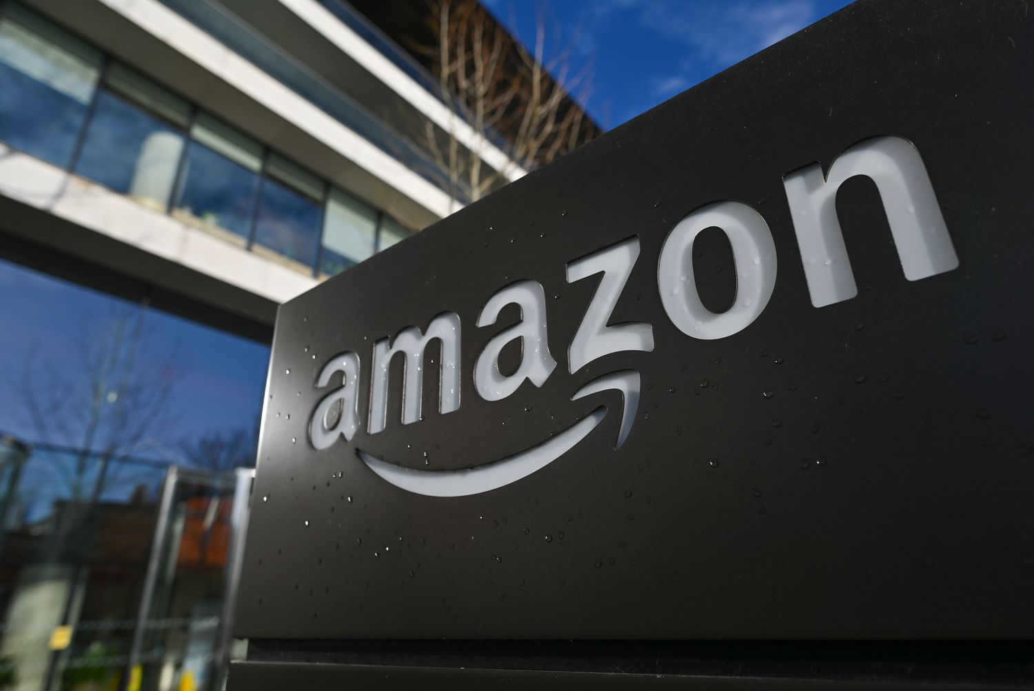 Amazon job cuts 2025 corporate headquarters illustrating AI automation impact