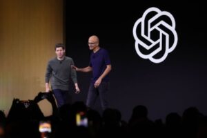 OpenAI CEO Sam Altman and Microsoft CEO Satya Nadella appear together after OpenAI recapitalization announcement.