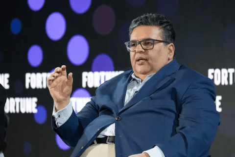 Speaker discussing small AI investment and data center infrastructure challenges in Asia at innovation forum