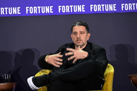 Business leader speaking on stage at a Fortune-branded event