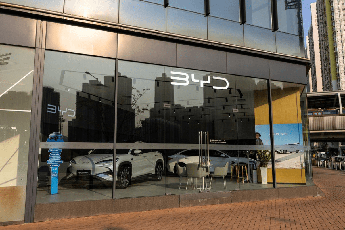 BYD electric vehicles displayed at a showroom in China as the automaker records slower sales growth in 2025