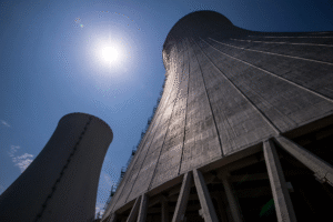 Nuclear power plant cooling towers representing Meta nuclear power deals for data center energy