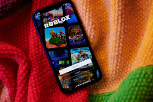 Roblox mobile app displaying login screen as the platform rolls out global age verification for chat access
