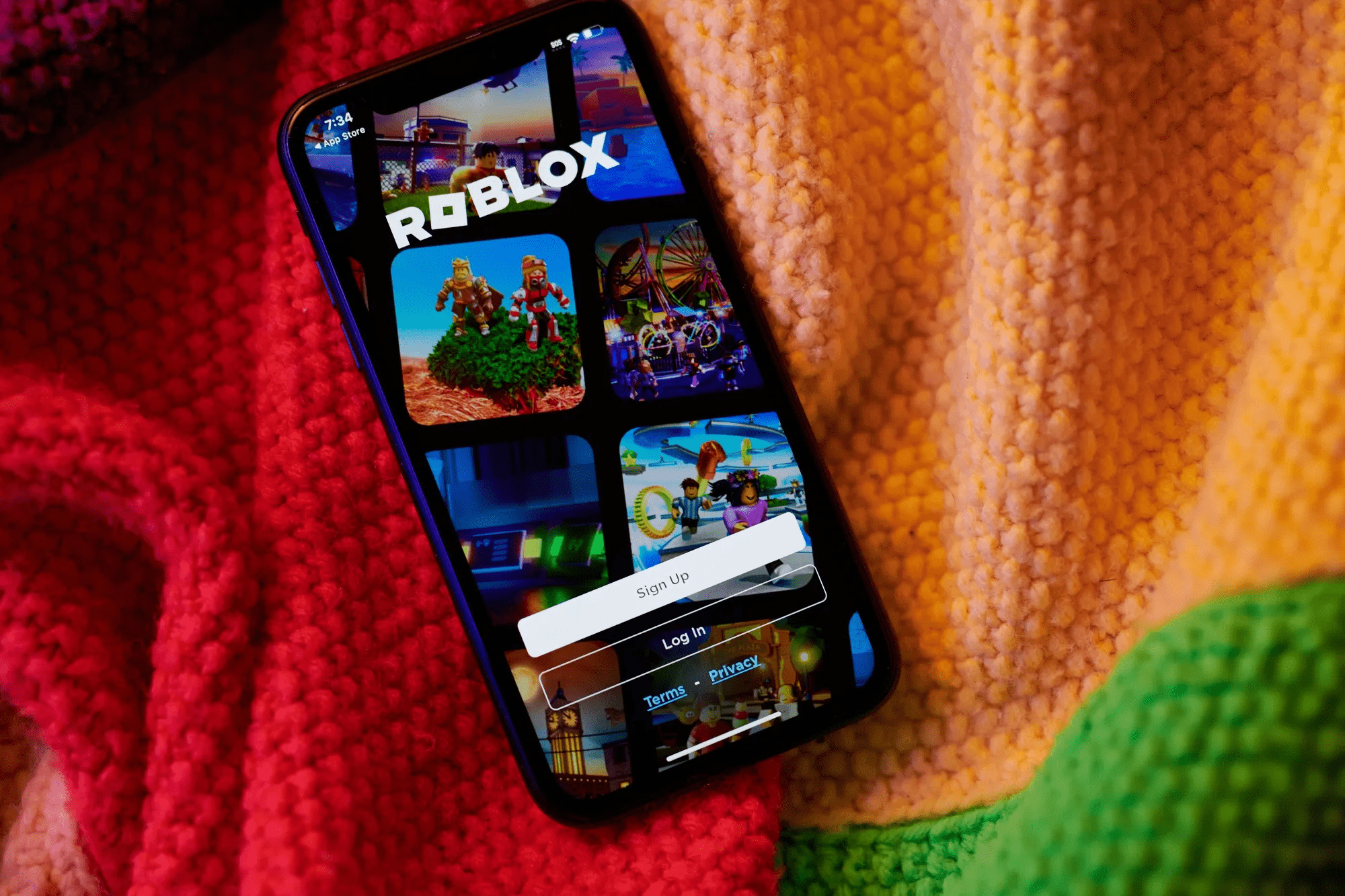 Roblox mobile app displaying login screen as the platform rolls out global age verification for chat access