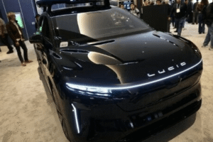 Production-intent robotaxi from Lucid and Nuro developed with Uber, featuring integrated sensors and halo design unveiled at CES 2026