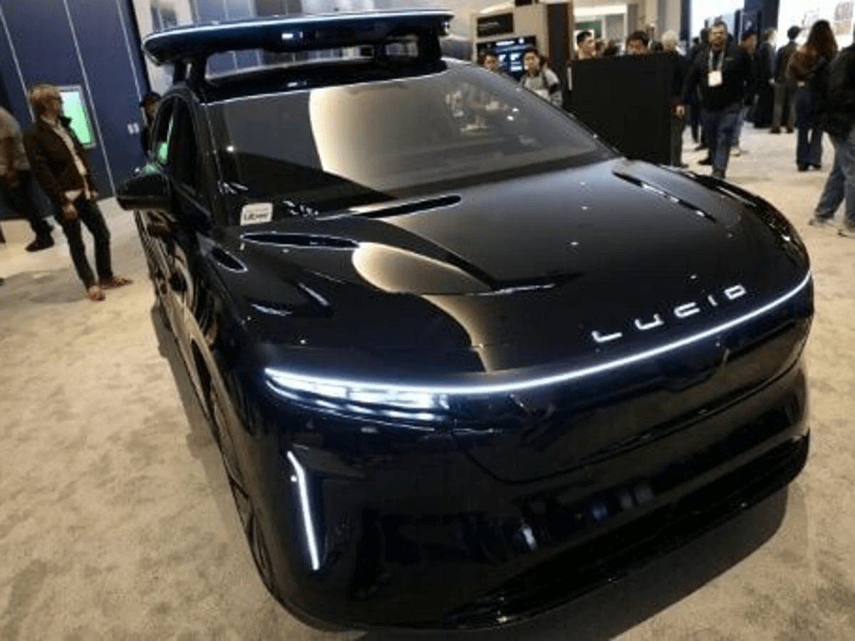 Production-intent robotaxi from Lucid and Nuro developed with Uber, featuring integrated sensors and halo design unveiled at CES 2026