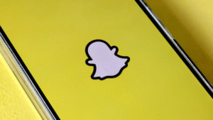 Snapchat logo displayed on a yellow background representing updates to parental controls and Family Center screen time insights