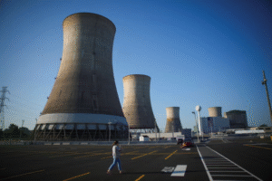 Nuclear power plant cooling towers as Trump energy department loosens nuclear safety rules for reactors on DOE property