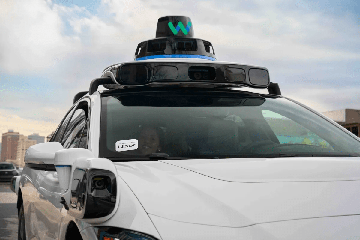 Uber autonomous vehicle equipped with sensors collecting real-world driving data for AV Labs partners