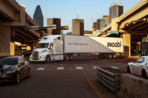 Waabi autonomous truck operating on city roads, showcasing AI-powered self-driving logistics technology