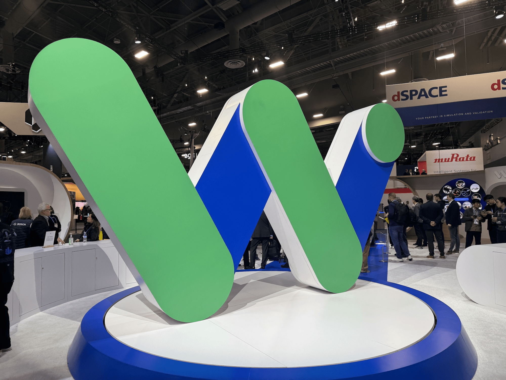 Waymo robotaxi branding displayed at CES 2026 highlighting autonomous vehicle technology and regulatory momentum in New York