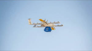 Wing drone carrying a Walmart package during on-demand drone delivery expansion